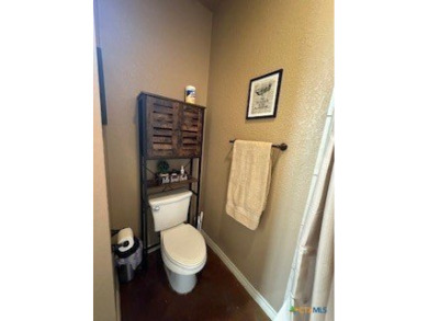 This stunning 4 bedroom, 2 bath home with a sparkling pool is on Gatesville Country Club in Texas - for sale on GolfHomes.com, golf home, golf lot