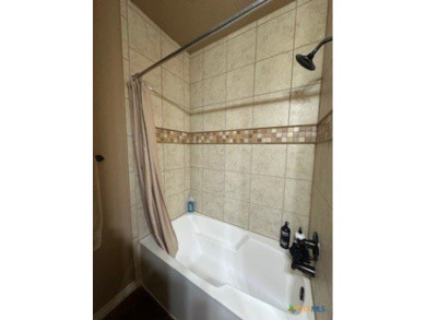 This stunning 4 bedroom, 2 bath home with a sparkling pool is on Gatesville Country Club in Texas - for sale on GolfHomes.com, golf home, golf lot