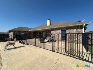 This stunning 4 bedroom, 2 bath home with a sparkling pool is on Gatesville Country Club in Texas - for sale on GolfHomes.com, golf home, golf lot