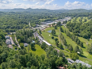 Located just minutes from the Blue Ridge Parkway, sits an on Grassy Creek Golf and Country Club in North Carolina - for sale on GolfHomes.com, golf home, golf lot