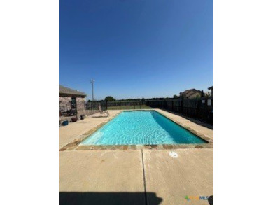 This stunning 4 bedroom, 2 bath home with a sparkling pool is on Gatesville Country Club in Texas - for sale on GolfHomes.com, golf home, golf lot