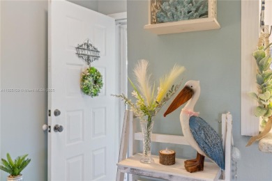 Welcome to your beautifully remodeled 2 bed, 2 bath on Pelican Pointe 9 Hole Course in Florida - for sale on GolfHomes.com, golf home, golf lot