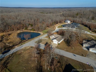 Come enjoy this peaceful setting on a very quiet street located on Indian Rock Golf Club in Missouri - for sale on GolfHomes.com, golf home, golf lot