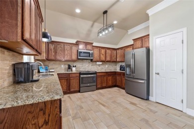 Experience luxury living on the 10th fairway of The Hideout Golf on Hideout Golf Club and Resort  in Texas - for sale on GolfHomes.com, golf home, golf lot