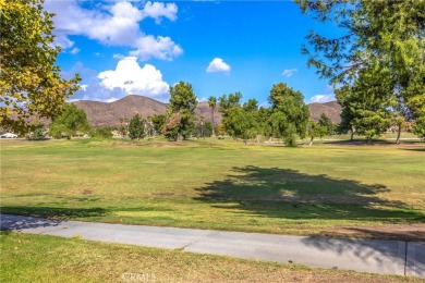 Massive View of the Golf course and mountains! Single story home on Menifee Lakes Country Club - Lakes in California - for sale on GolfHomes.com, golf home, golf lot