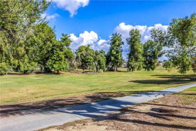 Massive View of the Golf course and mountains! Single story home on Menifee Lakes Country Club - Lakes in California - for sale on GolfHomes.com, golf home, golf lot