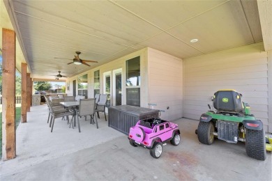 Experience luxury living on the 10th fairway of The Hideout Golf on Hideout Golf Club and Resort  in Texas - for sale on GolfHomes.com, golf home, golf lot