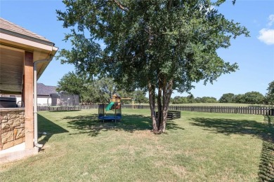 Experience luxury living on the 10th fairway of The Hideout Golf on Hideout Golf Club and Resort  in Texas - for sale on GolfHomes.com, golf home, golf lot