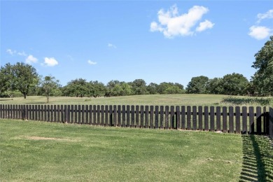 Experience luxury living on the 10th fairway of The Hideout Golf on Hideout Golf Club and Resort  in Texas - for sale on GolfHomes.com, golf home, golf lot