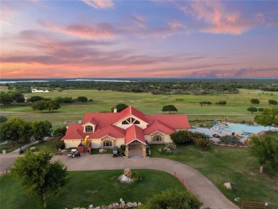 Experience luxury living on the 10th fairway of The Hideout Golf on Hideout Golf Club and Resort  in Texas - for sale on GolfHomes.com, golf home, golf lot