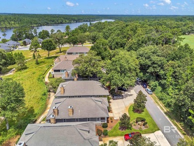 Wake up to stunning lake and golf course views in this on Steelwood Country Club in Alabama - for sale on GolfHomes.com, golf home, golf lot