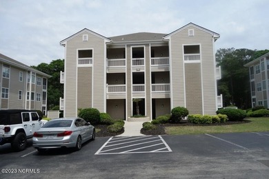 Beautifully furnished condo in Sea Trail Plantation with a golf on Sea Trail Golf Resort in North Carolina - for sale on GolfHomes.com, golf home, golf lot