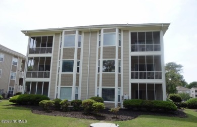 Beautifully furnished condo in Sea Trail Plantation with a golf on Sea Trail Golf Resort in North Carolina - for sale on GolfHomes.com, golf home, golf lot