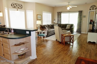 Beautifully furnished condo in Sea Trail Plantation with a golf on Sea Trail Golf Resort in North Carolina - for sale on GolfHomes.com, golf home, golf lot