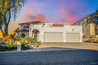 This home is on a quiet cul-de-sac at the edge of the Lake on London Bridge Golf Course in Arizona - for sale on GolfHomes.com, golf home, golf lot