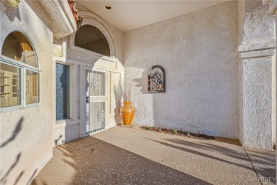 This home is on a quiet cul-de-sac at the edge of the Lake on London Bridge Golf Course in Arizona - for sale on GolfHomes.com, golf home, golf lot