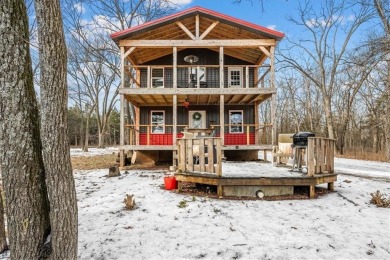 Welcome to your intriguing lake house in the serene Sugar Valley on Sugar Valley Lakes Golf Course in Kansas - for sale on GolfHomes.com, golf home, golf lot