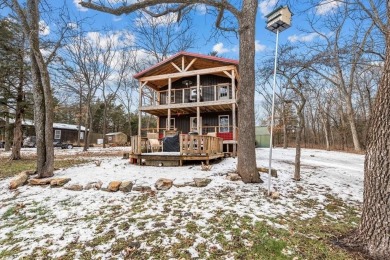 Welcome to your intriguing lake house in the serene Sugar Valley on Sugar Valley Lakes Golf Course in Kansas - for sale on GolfHomes.com, golf home, golf lot