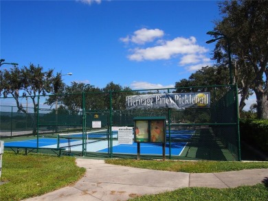 You're going to love this active, vibrant 55+ guard-gated golf on Heritage Pines Country Club in Florida - for sale on GolfHomes.com, golf home, golf lot