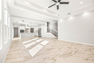 Welcome to this stunning 5-bedroom, 5.5-bathroom CONTEMPORARY on Temple Terrace Golf and Country Club in Florida - for sale on GolfHomes.com, golf home, golf lot