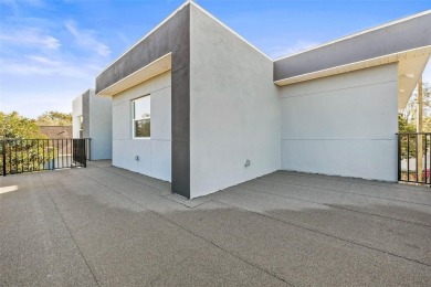 Welcome to this stunning 5-bedroom, 5.5-bathroom CONTEMPORARY on Temple Terrace Golf and Country Club in Florida - for sale on GolfHomes.com, golf home, golf lot