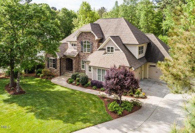 This Custom Built home by Grayson Homes is located in the highly on Hasentree Club in North Carolina - for sale on GolfHomes.com, golf home, golf lot