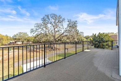 Welcome to this stunning 5-bedroom, 5.5-bathroom CONTEMPORARY on Temple Terrace Golf and Country Club in Florida - for sale on GolfHomes.com, golf home, golf lot