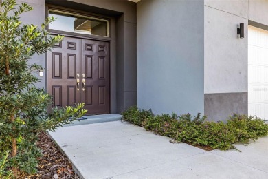 Welcome to this stunning 5-bedroom, 5.5-bathroom CONTEMPORARY on Temple Terrace Golf and Country Club in Florida - for sale on GolfHomes.com, golf home, golf lot