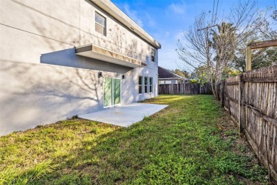 Welcome to this stunning 5-bedroom, 5.5-bathroom CONTEMPORARY on Temple Terrace Golf and Country Club in Florida - for sale on GolfHomes.com, golf home, golf lot