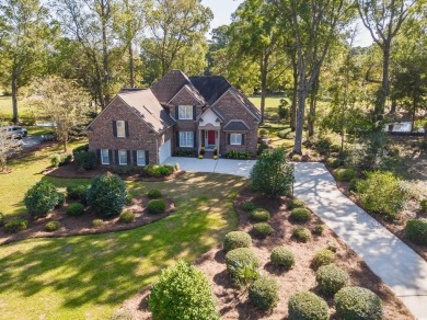 This is a beautiful brick home with loads of curb appeal in the on Litchfield Country Club in South Carolina - for sale on GolfHomes.com, golf home, golf lot