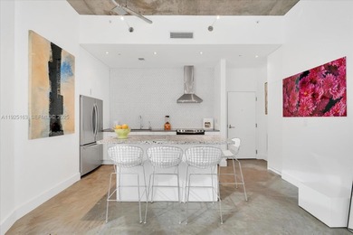 Extra-large loft-style studio at 2001 Meridian Ave with 12-ft on Miami Beach Golf Club in Florida - for sale on GolfHomes.com, golf home, golf lot