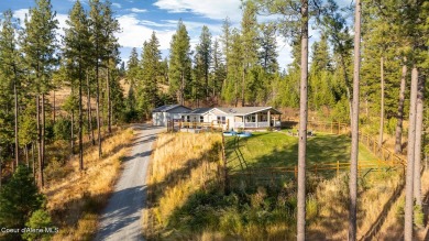 Capture Mount Spokane views and stunning sunsets from the on Stoneridge Golf Club in Idaho - for sale on GolfHomes.com, golf home, golf lot