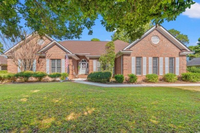 This beautifully furnished ranch-style home is nestled at the on Burning Ridge Golf Course in South Carolina - for sale on GolfHomes.com, golf home, golf lot