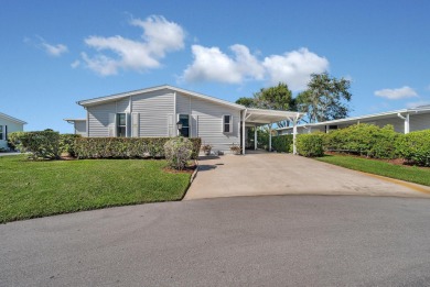 Enjoy stunning lakefront views from this beautiful TRIPLE-wide on Savanna Golf Club in Florida - for sale on GolfHomes.com, golf home, golf lot