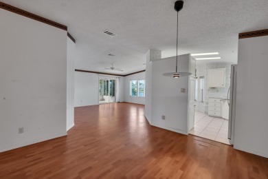 Enjoy stunning lakefront views from this beautiful TRIPLE-wide on Savanna Golf Club in Florida - for sale on GolfHomes.com, golf home, golf lot