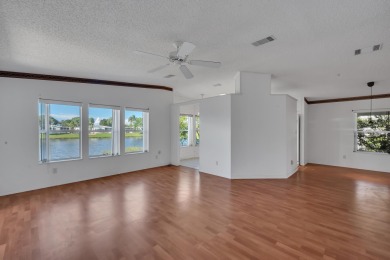 Enjoy stunning lakefront views from this beautiful TRIPLE-wide on Savanna Golf Club in Florida - for sale on GolfHomes.com, golf home, golf lot