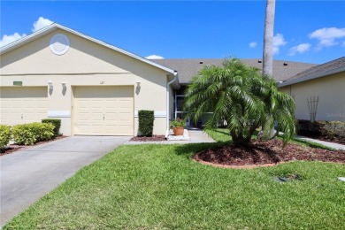 Welcome to 127 Club Villas Drive, a charming single-story on Remington Golf Club in Florida - for sale on GolfHomes.com, golf home, golf lot