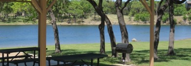 This lot features lake views from a second story and hill on Bar-K Golf Course in Texas - for sale on GolfHomes.com, golf home, golf lot