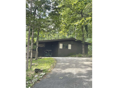 What a unique property on a large, corner lot (3 lots replatted on Indian Hills Country Club in Arkansas - for sale on GolfHomes.com, golf home, golf lot
