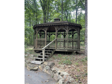 What a unique property on a large, corner lot (3 lots replatted on Indian Hills Country Club in Arkansas - for sale on GolfHomes.com, golf home, golf lot