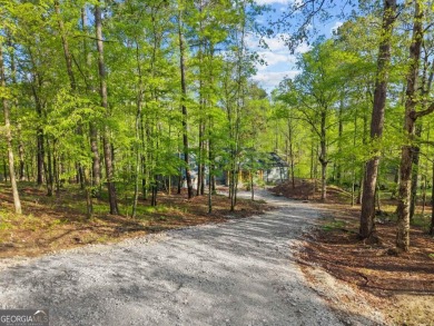 Stunning Lakefront Luxury Home in Reynolds Landing with Sunset on Reynolds Lake Oconee - The Landing in Georgia - for sale on GolfHomes.com, golf home, golf lot