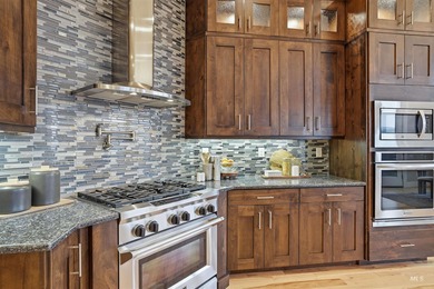 Custom luxury meets breathtaking scenery in this exceptional on Quail Hollow Golf Club in Idaho - for sale on GolfHomes.com, golf home, golf lot