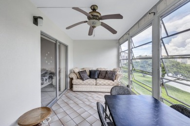 Spacious 2 bed, 2 bath condo in the popular Wynmoor community on Wynmoor Golf Course in Florida - for sale on GolfHomes.com, golf home, golf lot