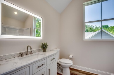 Welcome to 1673 Carriage Ln in Little River, SC -- a modern on Glen Dornoch Waterway Golf Links in South Carolina - for sale on GolfHomes.com, golf home, golf lot