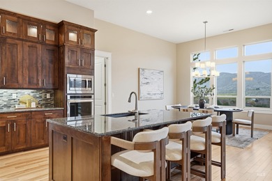 Custom luxury meets breathtaking scenery in this exceptional on Quail Hollow Golf Club in Idaho - for sale on GolfHomes.com, golf home, golf lot