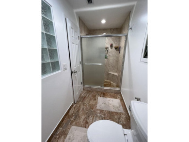 THIS HOME HAS EVERYTHING YOU ARE LOOKING FOR!  Totally upgrade & on Boca Greens Country Club in Florida - for sale on GolfHomes.com, golf home, golf lot