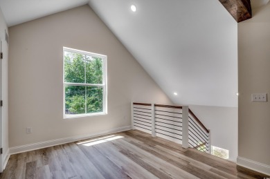 Welcome to 1673 Carriage Ln in Little River, SC -- a modern on Glen Dornoch Waterway Golf Links in South Carolina - for sale on GolfHomes.com, golf home, golf lot