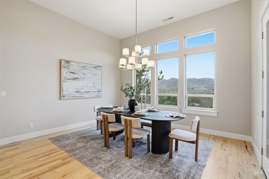 Custom luxury meets breathtaking scenery in this exceptional on Quail Hollow Golf Club in Idaho - for sale on GolfHomes.com, golf home, golf lot