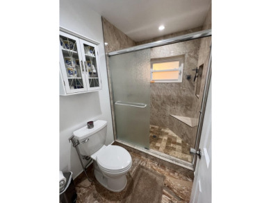 THIS HOME HAS EVERYTHING YOU ARE LOOKING FOR!  Totally upgrade & on Boca Greens Country Club in Florida - for sale on GolfHomes.com, golf home, golf lot