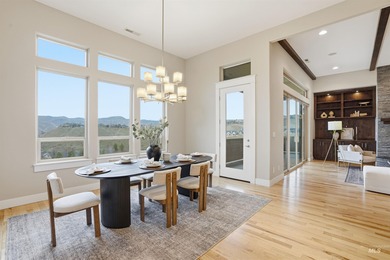 Custom luxury meets breathtaking scenery in this exceptional on Quail Hollow Golf Club in Idaho - for sale on GolfHomes.com, golf home, golf lot